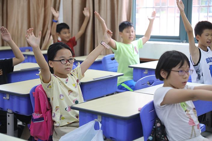 Students attend a summer tutoring class in Zhuhai, South China's Guangdong province, on July.19. Photo: VCG