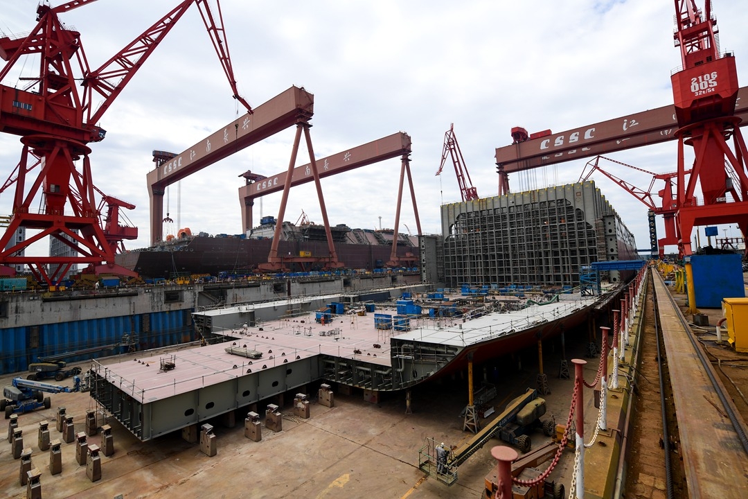 Workers at a CSSC shipyard build a cargo ship in Shanghai, May 23. Photo: VCG